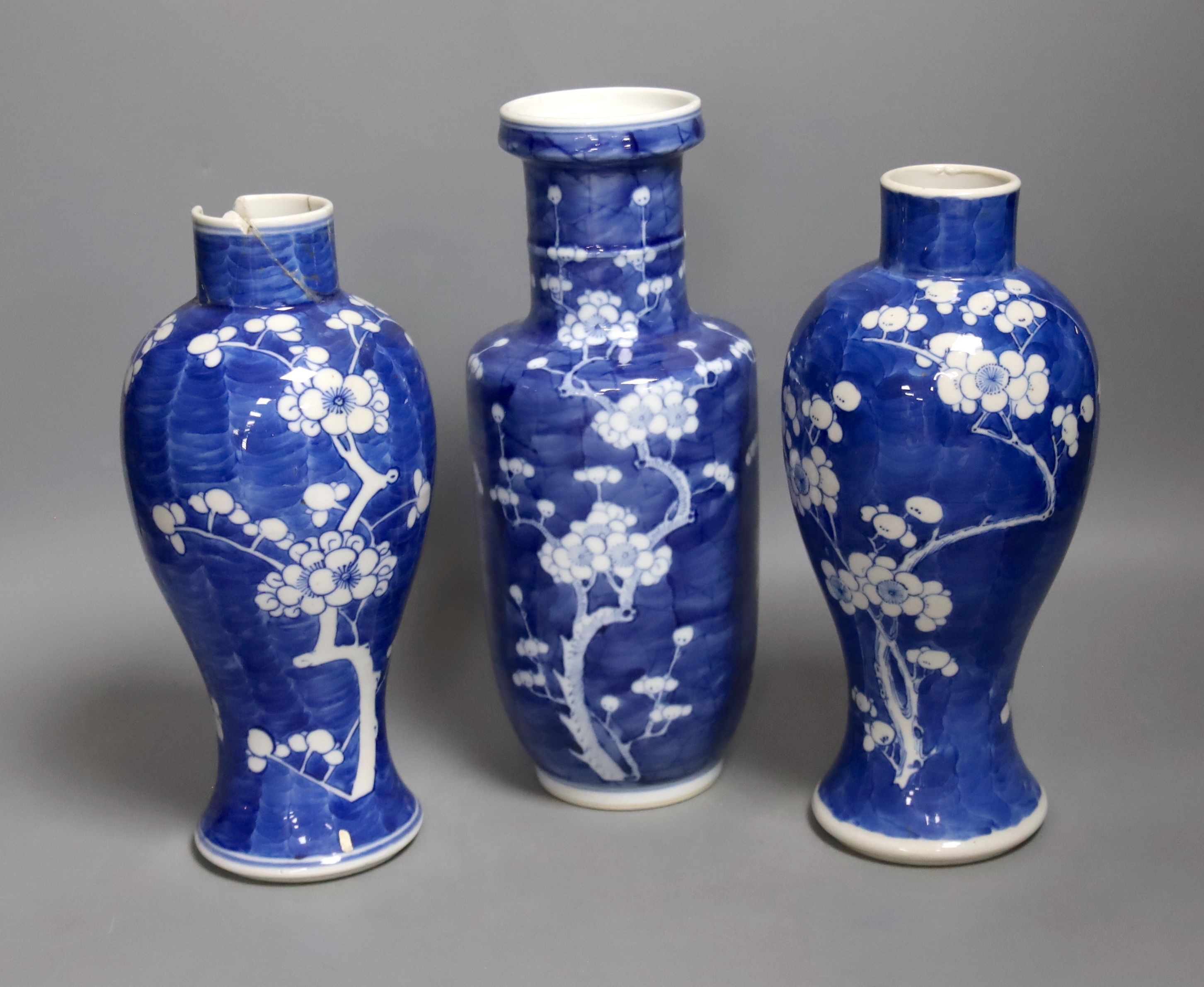 Three Chinese blue and white prunus vases. 25.5cm